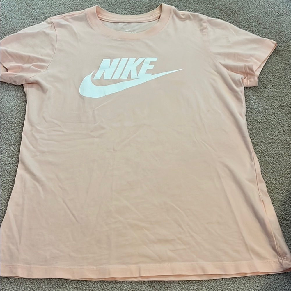 The Nike tee size small Pink